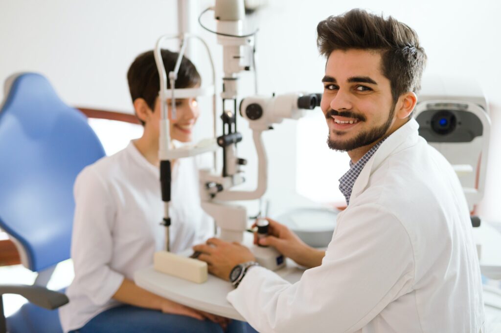 optometrist checking patient eyesight and vision correction